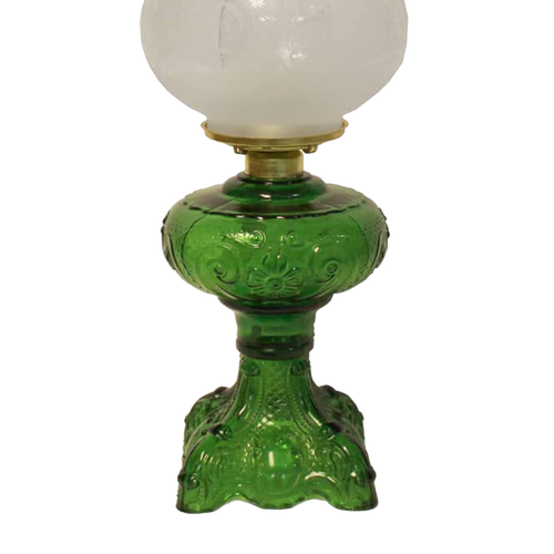 Handcrafted green glass oil lamp with intricately sculptured base and heavy brass-plated burner, topped with etched frosted glass chimney, ideal for Lamps & Lighting, Oil Lamps, Table Lamps, Best Sellers, and Promo Eligible collections.