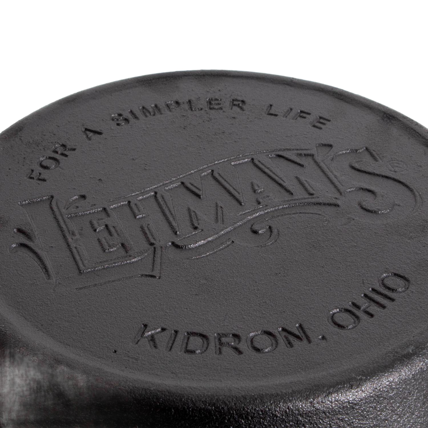 Close-up of the embossed bottom of a handcrafted cast iron pan featuring Lehman’s logo and Kidron, Ohio location, perfect for Kitchen & Food, Cast Iron, and Cookware collections.