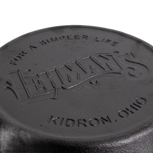 Close-up of the embossed bottom of a handcrafted cast iron pan featuring Lehman’s logo and Kidron, Ohio location, perfect for Kitchen & Food, Cast Iron, and Cookware collections.