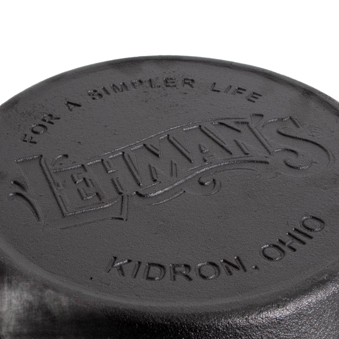 Close-up of the embossed bottom of a handcrafted cast iron pan featuring Lehman’s logo and Kidron, Ohio location, perfect for Kitchen & Food, Cast Iron, and Cookware collections.