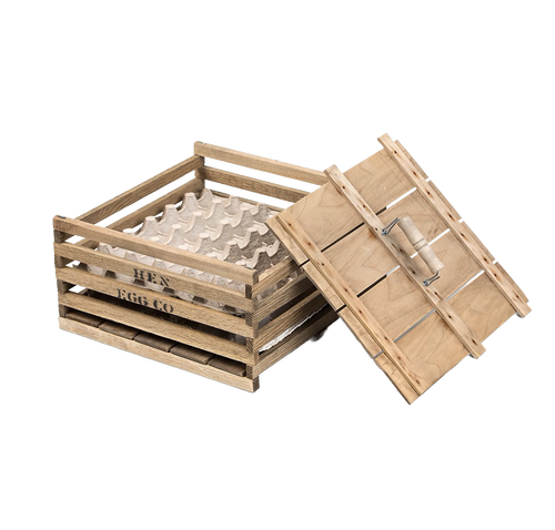 Handcrafted wooden egg crate with a slatted design and removable lid, perfect for safely transporting eggs; ideal for farm, garden, and animal care use.