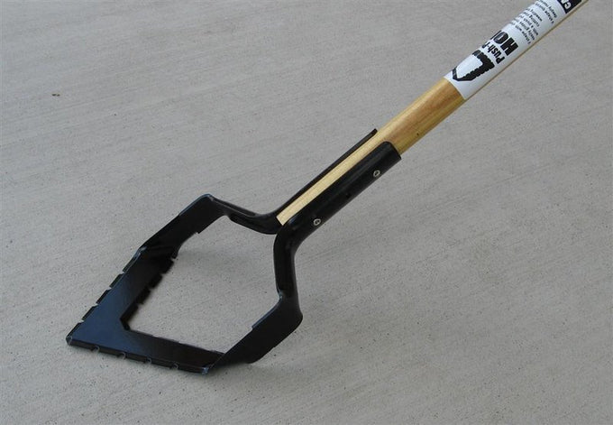Handcrafted push-pull garden hoe with a long ash wooden handle and hardened steel serrated blade, ideal for efficient weed removal and soil cultivation in farm, garden, and lawncare tasks, made in USA.