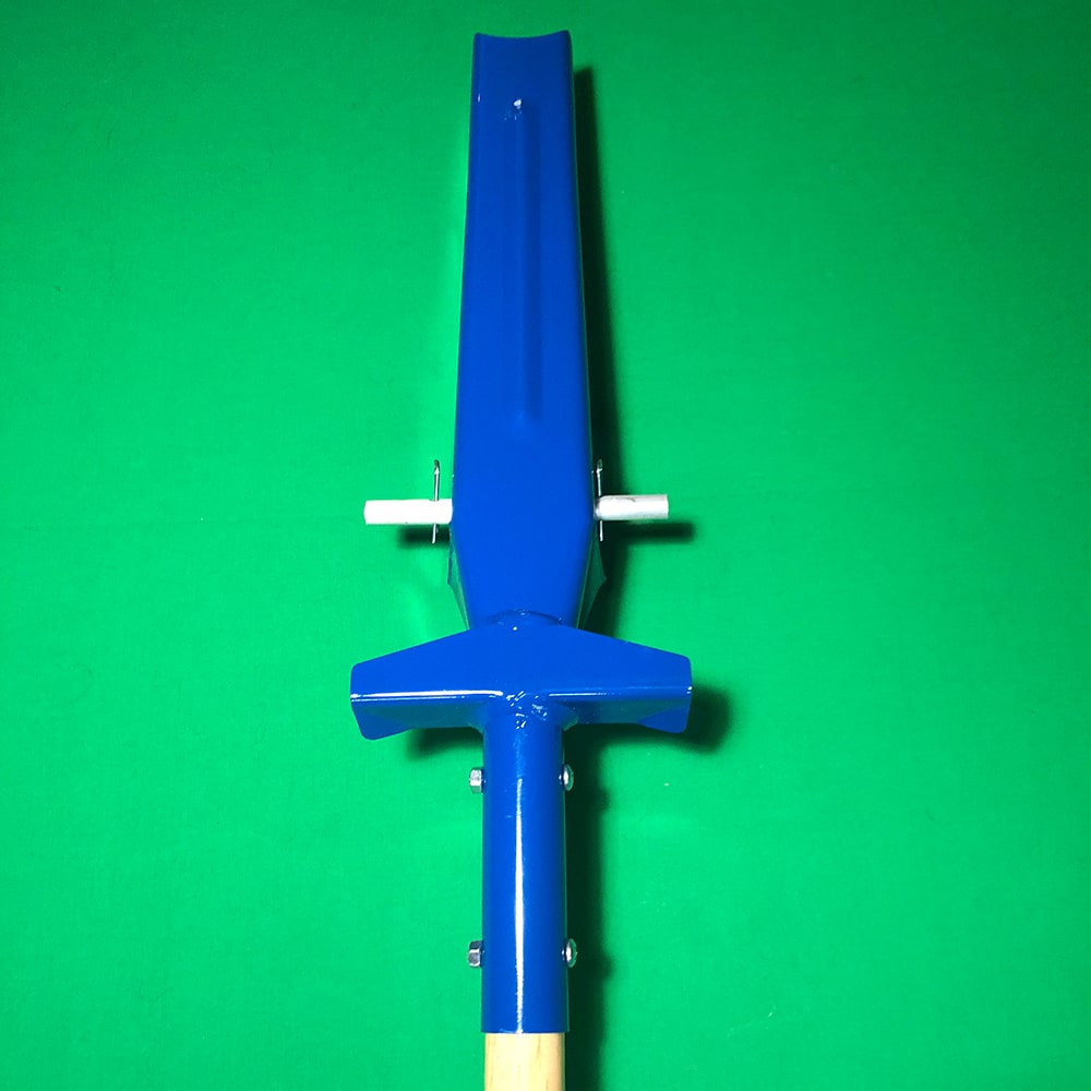 Handcrafted blue trenching shovel blade with sharpened side edges and wooden handle, designed for clean trenching and conduit installation in farm, garden, and hand tool collections.