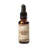 Handcrafted amber glass bottle of all-natural beard oil with dropper cap, made in USA, conditioning and taming unruly beards, featured in Health & Wellness, Grooming, and Best Sellers collections.