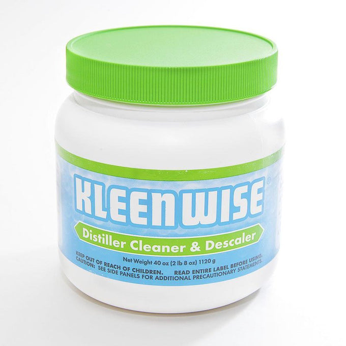White plastic jar with a bright green lid labeled as a distiller cleaner and descaler, ideal for appliances, water treatment, and USA made collections.