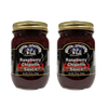 Two handcrafted glass jars of raspberry chipotle sauce with gold lids, featuring a black label with fiery design, made in USA, ideal for Kitchen & Food, Pantry, and Best Sellers collections.