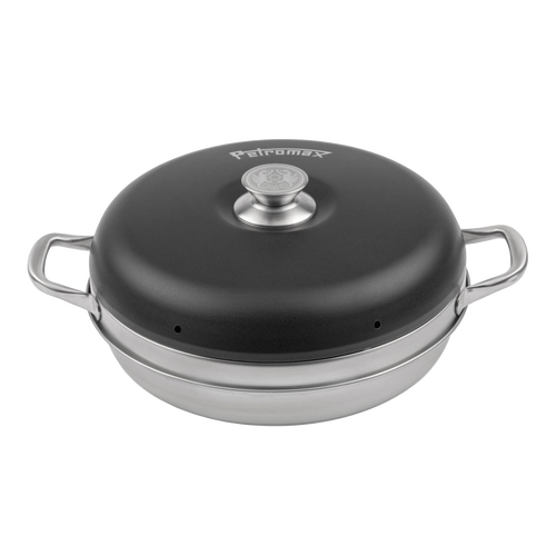 Compact camping oven with a black domed lid and stainless steel base, featuring side handles and a central knob, designed for outdoor baking and included in Camping and Best Sellers collections.