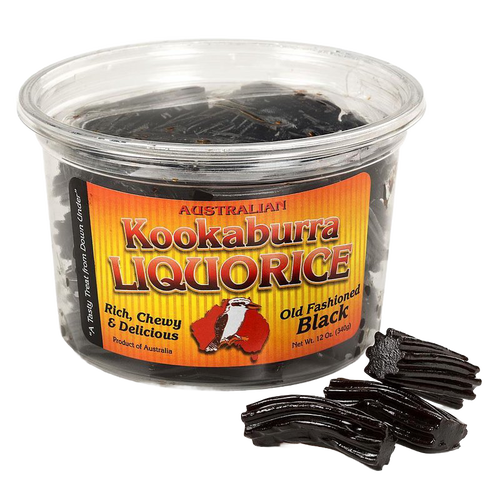 Clear plastic tub of handcrafted Australian black licorice with rich, chewy texture and several pieces of old-fashioned black licorice beside it, featured in Kitchen & Food, Snacks and Sweets, Candy, Best Sellers, and Promo Eligible collections.