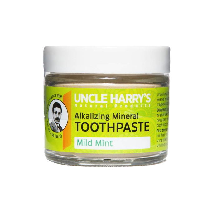 Glass jar of handcrafted all-natural alkalizing mint toothpaste with mineral clay and sea salt, featured in Health & Wellness, Grooming, and USA Made collections.