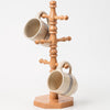 Handcrafted wooden mug tree with a light honey-brown stain, holding two ceramic mugs, designed for easy mug storage and display, part of Kitchen & Food, Storage and Serving, USA Made, Amish Made collections.