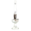 Unique handcrafted clear glass oil lamp with silver metal burner and tall chimney, designed for bright, long-lasting light, featured in Lamps & Lighting, Oil Lamps, Table Lamps, Best Sellers, and Promo Eligible collections.