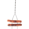 Two grilled hot dogs held by a heavy-duty, two-pronged galvanized steel roasting stick with an extra-long wooden handle, designed for camping and outdoor use.
