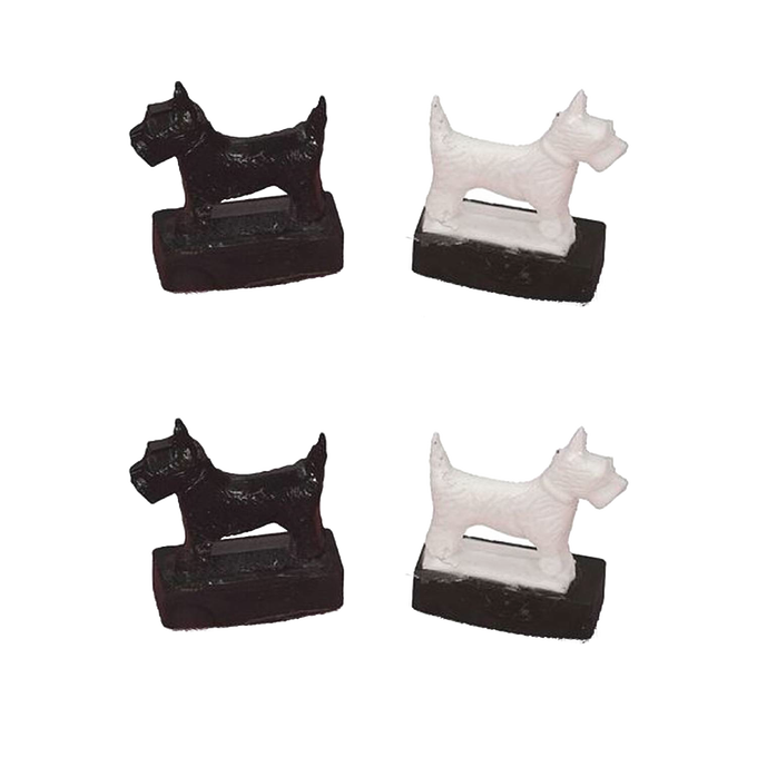 Handcrafted set of four magnetic Scottie dog toys in black and white, designed for indoor play and children's entertainment, part of USA Made and Best Sellers collections.