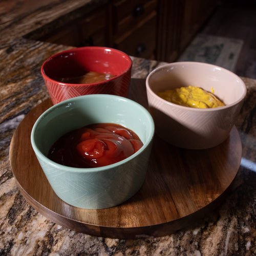 Handcrafted wooden Lazy Susan turntable with three ceramic condiment bowls in red, beige, and green holding mustard, ketchup, and another sauce, ideal for Kitchen & Food, Storage and Serving, Best Sellers, Promo Eligible collections.