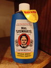 Blue 8-ounce bottle of Mrs. Stewart's concentrated liquid bluing with vintage-style label, non-toxic and biodegradable, made in USA, ideal for Laundry Supplies and Home & Decor collections.