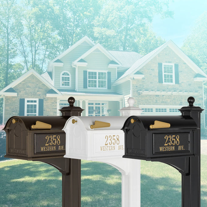 Three handcrafted custom Balmoral-style mailboxes in white, black, and bronze finishes, each featuring gold address plaques and posts, displayed in a suburban Home & Decor setting.