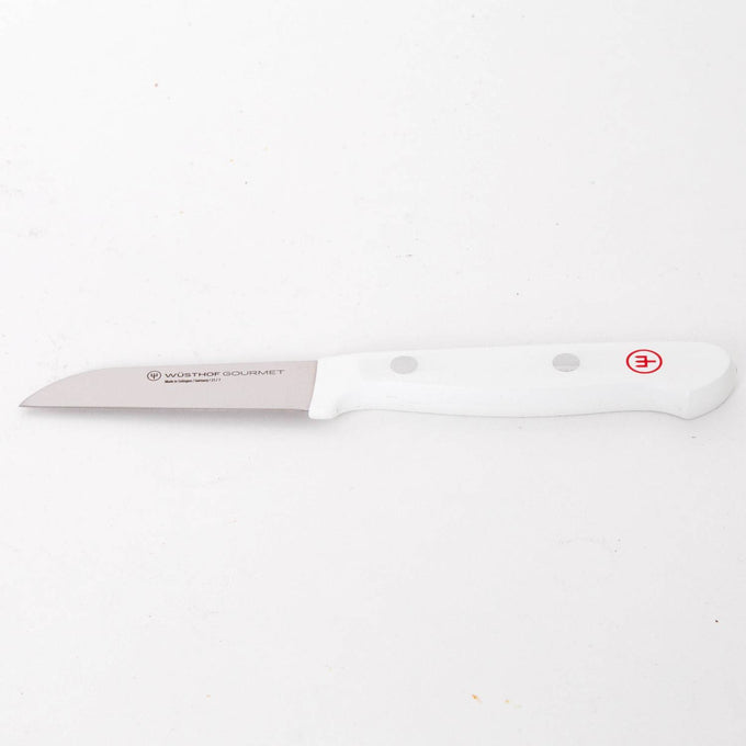 Kitchen paring knife with a stainless steel blade and ergonomic white handle, part of a 16-piece Wusthof Gourmet set designed for Food Prep, Kitchen Knives, and Farm, Garden & Tool collections.