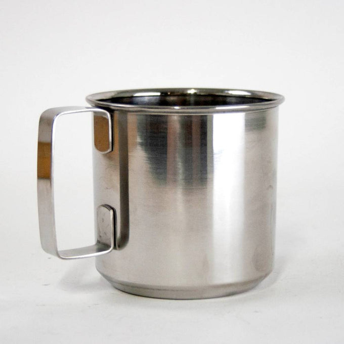 Sturdy stainless steel cup with seamless construction and convenient handle, designed for durability and travel, featured in Kitchen & Food, Dinnerware, and Best Sellers collections.