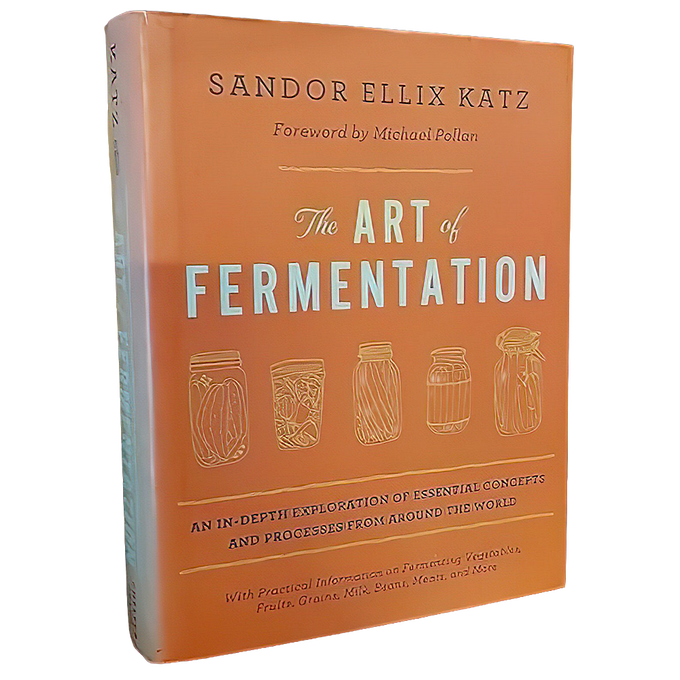 Hardcover book with a vibrant orange cover titled “The Art of Fermentation” featuring minimalist line art jars, part of Toys, Books & Games, Fermenting and Pickling, and Best Sellers collections.