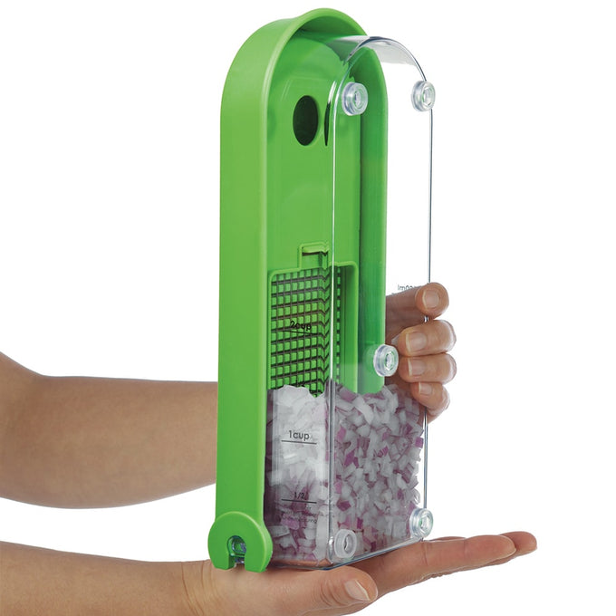 Handcrafted green veggie and fruit chopper held in hands, featuring a clear container collecting diced onions, ideal for Kitchen & Food, Food Prep, Choppers and Cutters, Kitchen Gadgets, Kitchen Accessories collections.