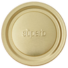 Close-up of a wide mouth, gold-tone canning jar lid embossed with the word superb, designed for secure sealing in food preservation and kitchen use, made in USA.