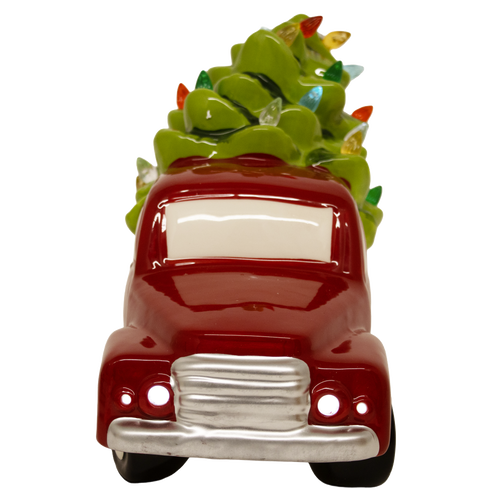 Handcrafted dolomite red truck carrying a vibrant green Christmas tree adorned with colorful LED lights, battery operated, perfect for Home & Decor, Holiday Decor, Best Sellers, and Promo Eligible collections.