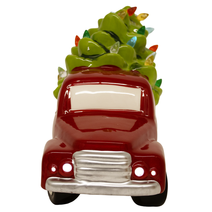 Handcrafted dolomite red truck carrying a vibrant green Christmas tree adorned with colorful LED lights, battery operated, perfect for Home & Decor, Holiday Decor, Best Sellers, and Promo Eligible collections.