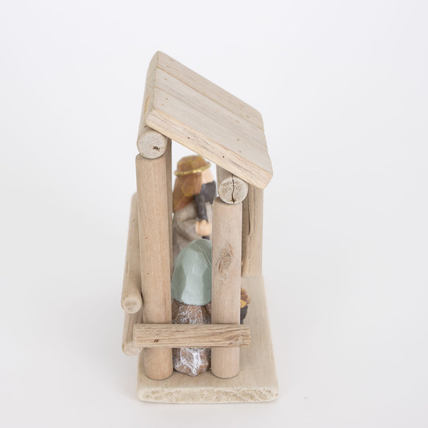 Handcrafted small nativity display featuring a simple wooden stable with attached resin Holy Family figurines, designed for Home & Decor, Holiday Decor, Best Sellers, and Promo Eligible collections.