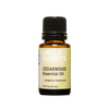 Amber glass bottle of handcrafted cedarwood essential oil with black cap and dropper, made in USA and ideal for Health & Wellness, Soapmaking, Candlemaking, and Health Remedies collections.