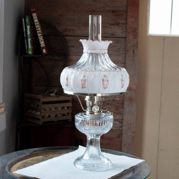 Unique handcrafted glass oil lamp featuring an ornate pink rose pattern on the shade with scalloped edge, suitable for lamps in Lamps & Lighting and Parts and Accessories collections.