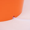 Close-up of orange handcrafted laundry spinner’s drainage spout with clear plastic tube, designed for efficient water removal in Home & Decor, Laundry Supplies, and Best Sellers collections.