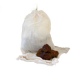 Natural cotton drawstring bag holding handcrafted soap nuts alongside several whole soap nuts, ideal for eco-friendly laundry supplies in Home & Decor and Soaps and Soapmaking collections.