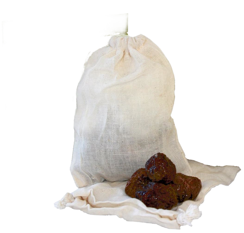Natural cotton drawstring bag holding handcrafted soap nuts alongside several whole soap nuts, ideal for eco-friendly laundry supplies in Home & Decor and Soaps and Soapmaking collections.