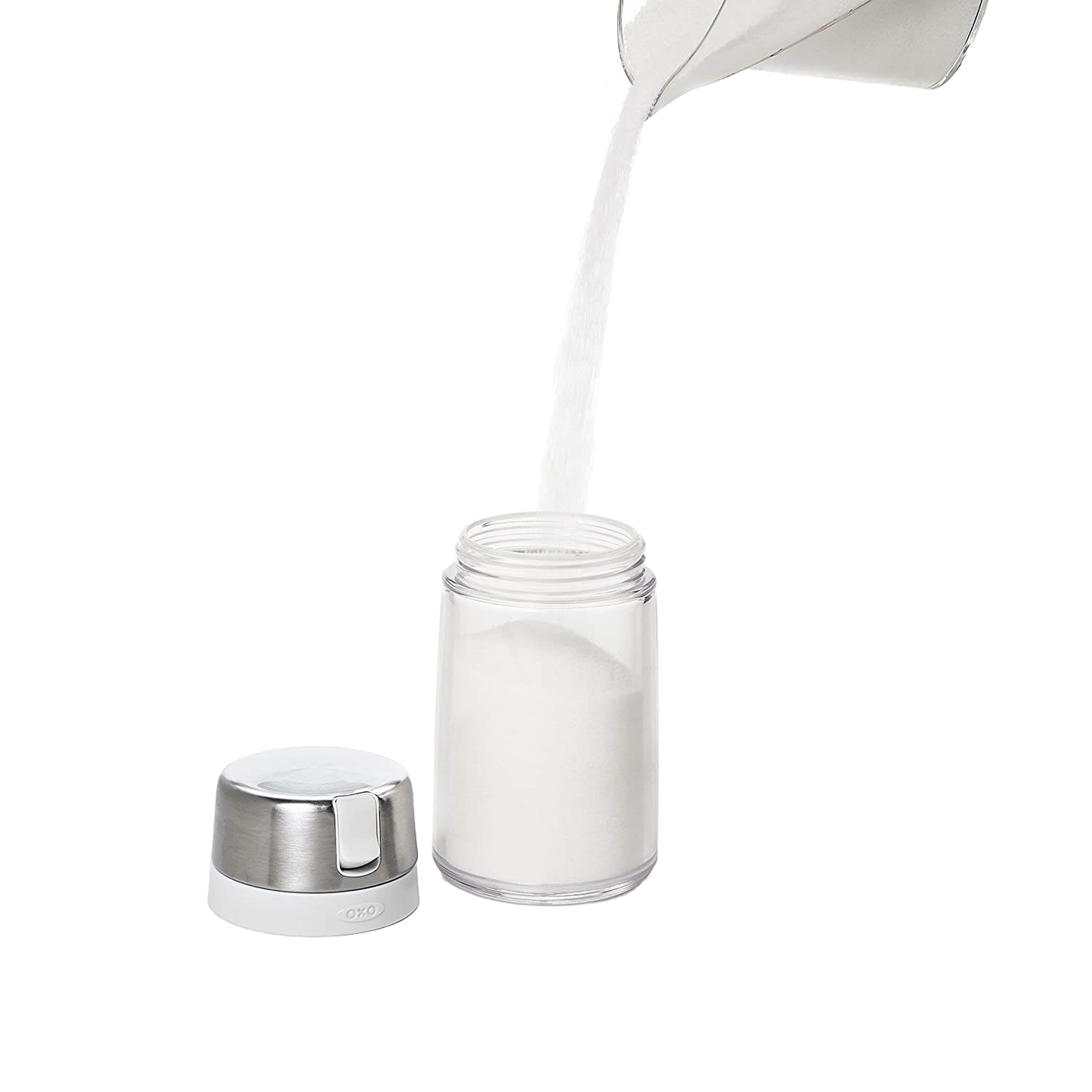 Clear glass sugar dispenser with stainless steel lid and wide side spout for easy, controlled pouring, designed to prevent moisture and clumping, ideal for Kitchen & Food, Kitchen Gadgets, Kitchen Accessories, Storage and Serving, Best Sellers, and Promo Eligible collections.