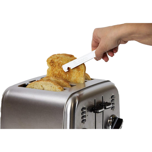 Hand using white Butterie toaster tong with serrated teeth and oven rack hook to safely lift toasted bread from stainless steel toaster, featured in kitchen gadgets and accessories collections.
