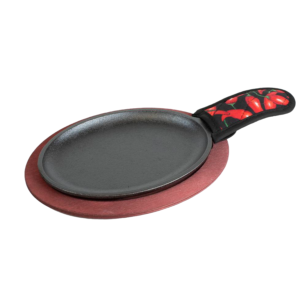 Oval cast iron griddle with red stained wooden underliner and chili pepper patterned handle cover, ideal for cooking fajitas found in Kitchen & Food, Cookware, and Camping collections.