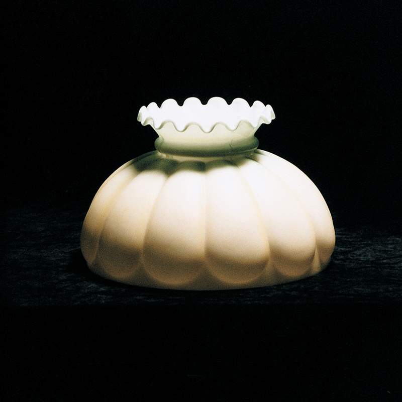 Handcrafted 10-inch oil lamp shade with a melon-inspired design, featuring a cream tint and ruffled top, part of lamps and lighting, parts, and best sellers collections.