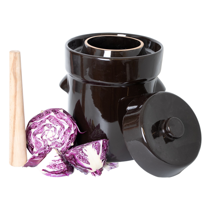Handcrafted dark stoneware fermenting crock with lid, wooden stomper, and inner weights, shown with fresh purple cabbage, perfect for Kitchen & Food, Food Preservation, Fermenting and Pickling, Best Sellers, and Promo Eligible collections.