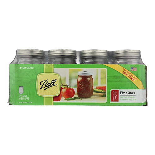 Case of twelve clear glass pint-sized canning jars with silver metal lids and bands, packaged with images of fresh tomatoes and preserves, suitable for Kitchen & Food, Food Preservation, Canning, USA Made, Best Sellers, and Promo Eligible collections.