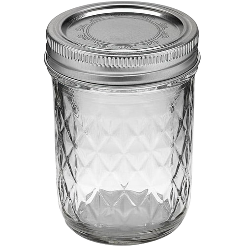Handcrafted clear glass jar with quilted pattern and regular metal lid, designed for food preservation and canning, featured in Kitchen & Food, USA Made, and Best Sellers collections.