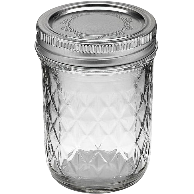 Handcrafted clear glass jar with quilted pattern and regular metal lid, designed for food preservation and canning, featured in Kitchen & Food, USA Made, and Best Sellers collections.