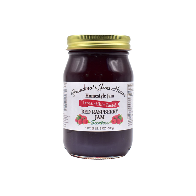 Handcrafted jar of seedless red raspberry jam with gold lid and white label featuring raspberry illustrations and "Irresistible Taste" banner, made in USA, ideal for Kitchen & Food, Pantry, Peanut Butter & Jellies, Best Sellers, and Promo Eligible collections.