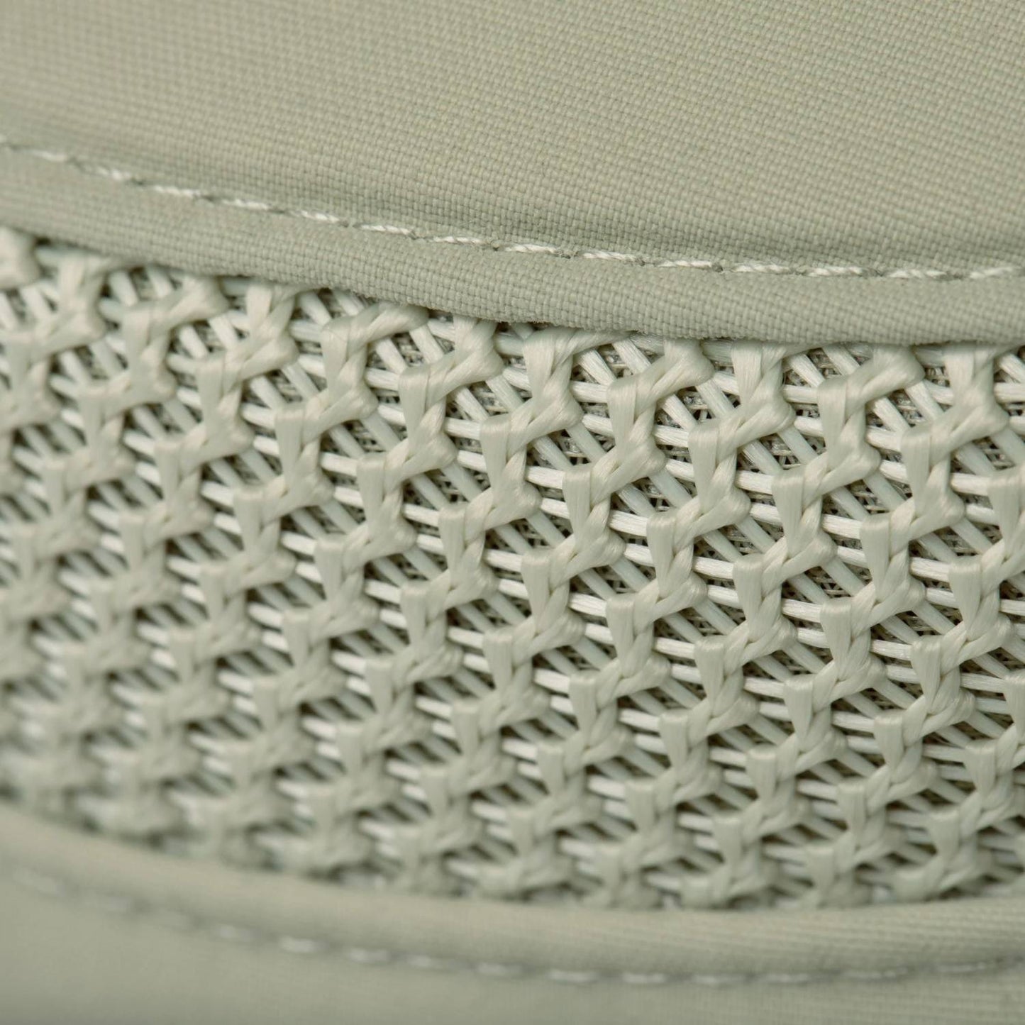 Close-up view of breathable mesh ventilation panel in khaki fabric, designed for moisture-wicking comfort and sun protection, ideal for outdoor gear in Health & Wellness and Camping collections.