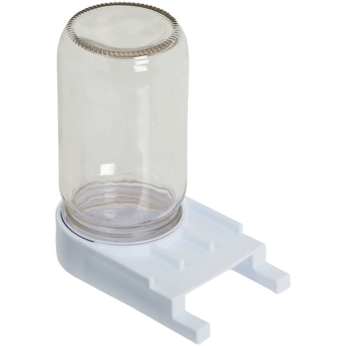 Clear glass jar feeder with a high-impact white plastic base designed for easy access inside beehives, handcrafted and made in USA for farm and garden use.