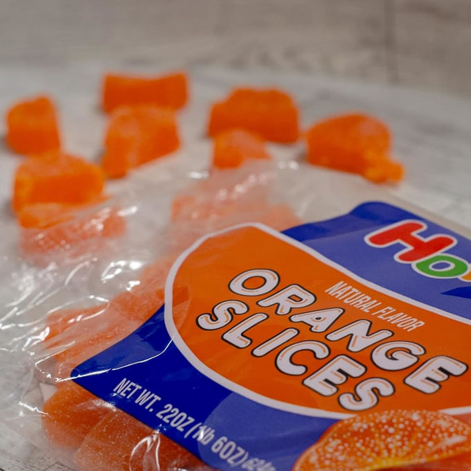 Bright orange sugar-coated slice candies with a chewy texture, showcasing handcrafted nostalgic sweets from Kitchen & Food, Food, Snacks and Sweets, Best Sellers, and Promo Eligible collections.