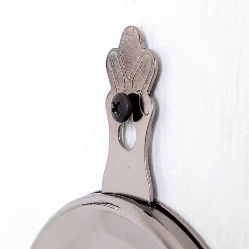 Close-up of a polished metal wall bracket with a decorative top and black screw, part of a handcrafted Lehman's Woodshed Wall Mounted Oil Lamp in Lamps & Lighting and Wall Lamps collections.