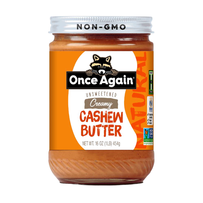 Jar of creamy cashew butter with orange label featuring a raccoon logo, marked non-GMO and gluten free, part of USA made Kitchen & Food and Best Sellers collections.