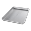 Durable aluminized steel quarter sheet pan with raised edges and ribbed base, designed for versatile baking and cooking, featured in Kitchen & Food, Cookware, and USA Made collections.