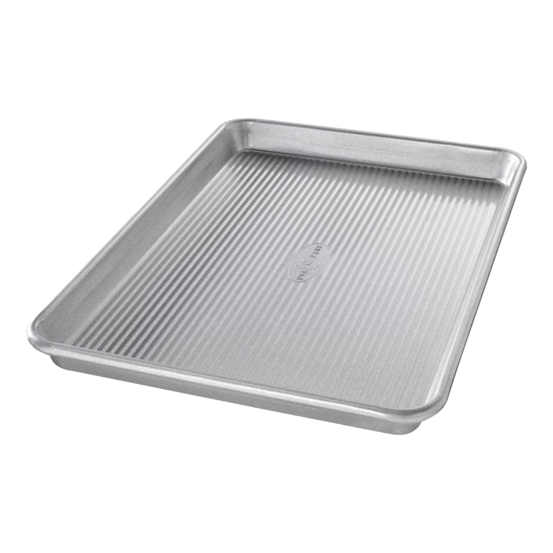 Durable aluminized steel quarter sheet pan with raised edges and ribbed base, designed for versatile baking and cooking, featured in Kitchen & Food, Cookware, and USA Made collections.