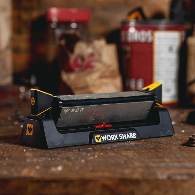Three-sided benchstone sharpener with coarse and fine diamond abrasive plates, black base with yellow angle guides, suitable for Farm, Garden & Tool and Kitchen & Food use.